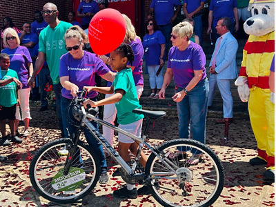 Children and Teknor Apex People with Bikes and Celebration
