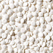 Close up of clean-cut white PVC granules pellets